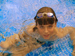 Image : boy swimming in blue pool