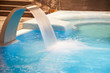 Empty Spa pool with waterfall jet and jacuzzy in action