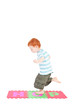 Boy hopping over word Boy hopping over word