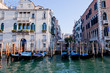goldola boat parking in front of building in grand canal Venice