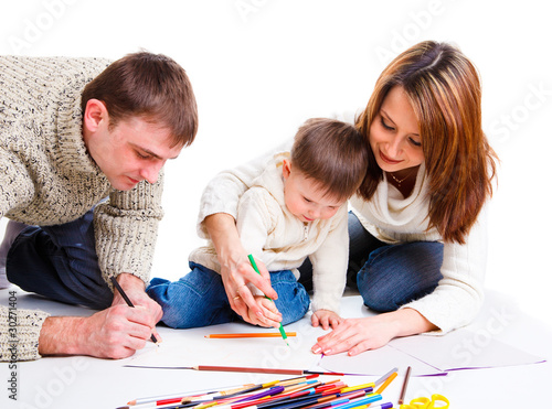 Photo: Parents drawing with son Parents drawing with son