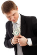 Man in a putting money in his pocket.