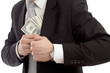 Man in a putting money in his pocket.