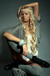 The blond girl on a gray background