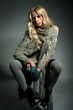 The blond girl on a gray background