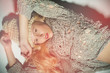 The blond girl on a gray background