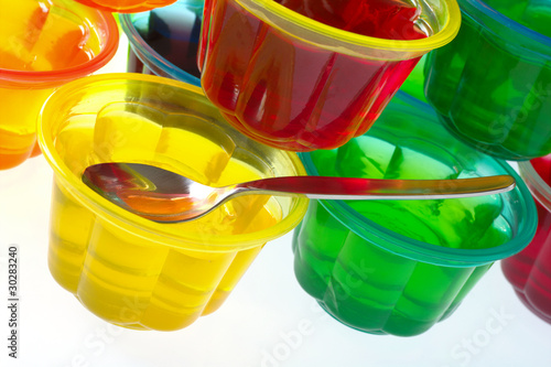 Photo: Colorful jellies in plastic bowls Colorful jellies in plastic bowls
