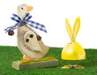 Easter goose and rabit staying on the grass