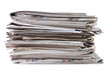 Various newspapers over white background