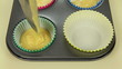 Video: Filling two paper cups with cake mix Filling two paper cups with cake mix