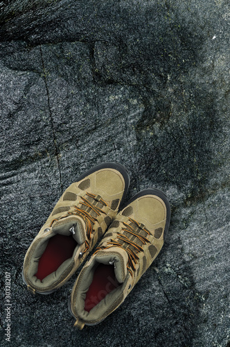 Photo: Hiking boots on rock Hiking boots on rock
