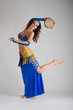 Photo: A dancer with a tambourine A dancer with a tambourine
