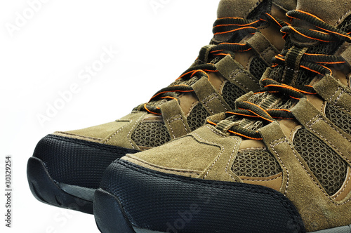 Photo: Hiking boots against white Hiking boots against white