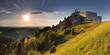Ruin of castle with sun