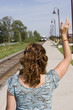 Commuter train woman waving