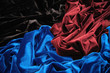 blue red and black glossy velvet is formative folds