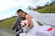 Photo: Married couple riding motorcycle on their wedding day Married couple riding motorcycle on their wedding day
