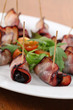Baked prunes in bacon Baked prunes in bacon