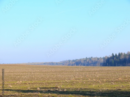Photo: Stubble field. Sky. Stubble field. Sky.