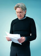 Senior man reading important papers