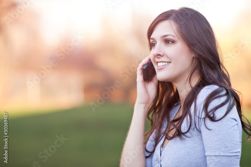 Photo: Woman on the phone Woman on the phone