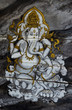 Paintings of Ganesh at the old wooden door.