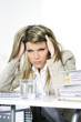 stressed woman working on computer