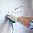 worker puts the wires