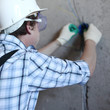 worker puts the wires