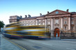 Trinity College at day in Dublin, Ireland. Bus quickly rides Trinity College at day in Dublin, Ireland. Bus quickly rides