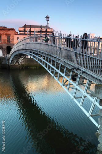 Photo: People going on Bridge in Dublin, Ireland People going on Bridge in Dublin, Ireland