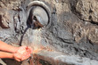 children's hands in clean water from fountain in Vatican wall children's hands in clean water from fountain in Vatican wall