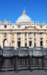 Vatican Museum in Basilica of St. Peter and rows of gray chairs Vatican Museum in Basilica of St. Peter and rows of gray chairs