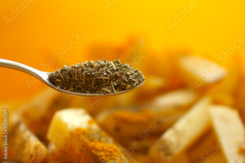 Photo: Spoon with dried spices Spoon with dried spices