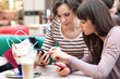 Two young pretty girls talking