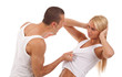 man screaming and pulling his girlfriend's shirt