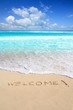 greetings welcome beach spell written on sand greetings welcome beach spell written on sand