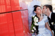 Photo: kiss by the red wall kiss by the red wall