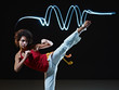hispanic woman playing capoeira martial art
