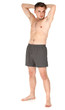 standing naked young man with raised arms