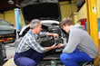 Teenager in professional training in workshop Teenager in professional training in workshop