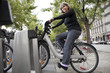 Woman on a bixi public bicycle