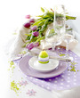 Place setting for Easter in violet color Place setting for Easter in violet color