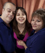 Pregnant young woman with her parents Pregnant young woman with her parents