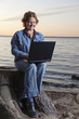 Happy businesswoman teleworking