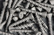 Dark metal screw