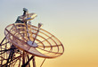 telecommunications tower at the sunset