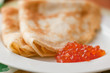 Pancake with red caviar