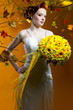 Photo: Beautiful redhead bride with a bouquet of flowers Beautiful redhead bride with a bouquet of flowers