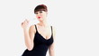 Woman in lingerie eat chewing gum